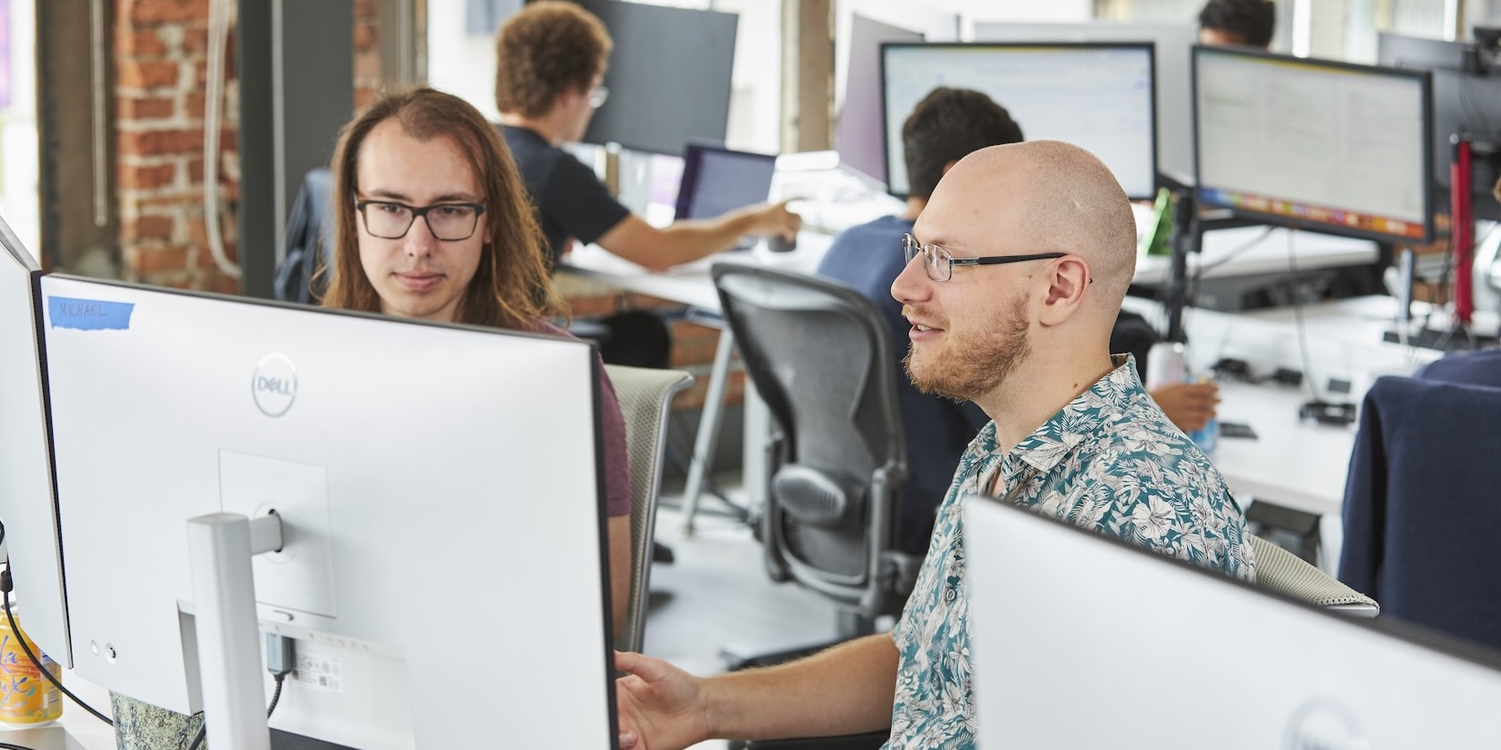 The Chalk team thinking hard together at the office.